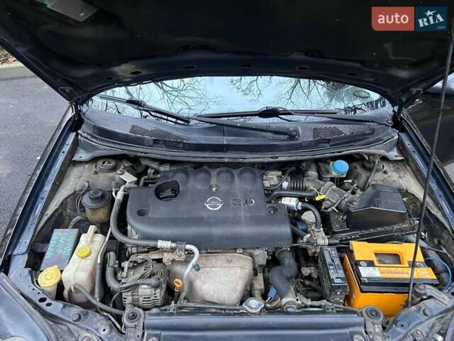 Черный Ниссан Примера, объемом двигателя 2 л и пробегом 188 тыс. км за 4290 $, фото 14 на Automoto.ua