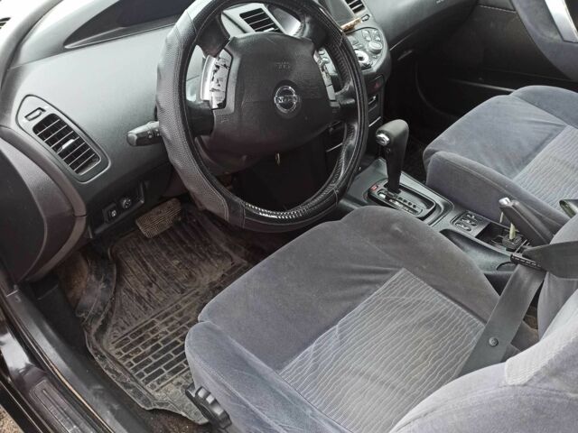 Черный Ниссан Примера, объемом двигателя 2 л и пробегом 280 тыс. км за 4500 $, фото 5 на Automoto.ua