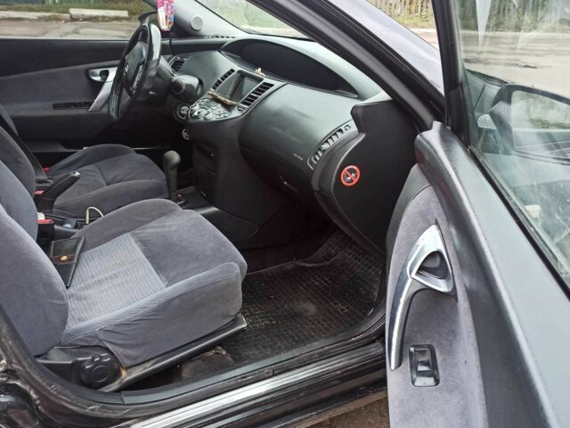 Черный Ниссан Примера, объемом двигателя 2 л и пробегом 280 тыс. км за 4500 $, фото 2 на Automoto.ua