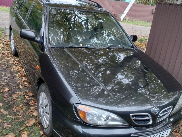 Черный Ниссан Примера, объемом двигателя 2 л и пробегом 212 тыс. км за 2700 $, фото 1 на Automoto.ua