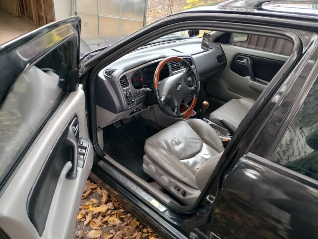 Черный Ниссан Примера, объемом двигателя 2 л и пробегом 212 тыс. км за 2700 $, фото 7 на Automoto.ua