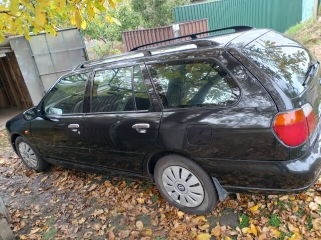 Черный Ниссан Примера, объемом двигателя 2 л и пробегом 212 тыс. км за 2700 $, фото 3 на Automoto.ua