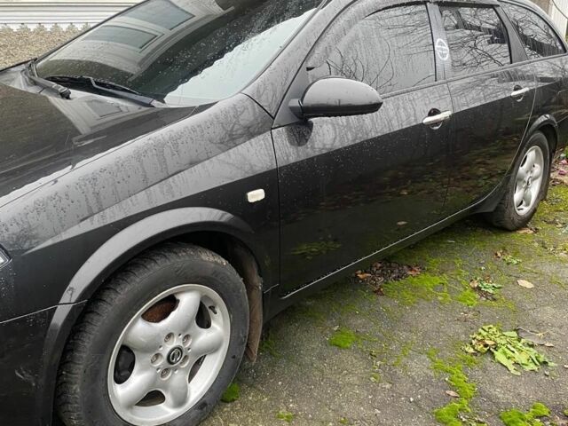 Черный Ниссан Примера, объемом двигателя 1.8 л и пробегом 157 тыс. км за 4500 $, фото 7 на Automoto.ua