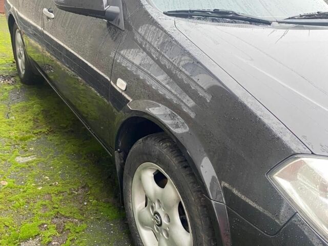 Черный Ниссан Примера, объемом двигателя 1.8 л и пробегом 157 тыс. км за 4500 $, фото 4 на Automoto.ua