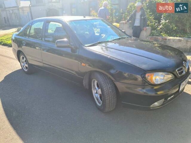 Черный Ниссан Примера, объемом двигателя 1.6 л и пробегом 377 тыс. км за 3200 $, фото 3 на Automoto.ua