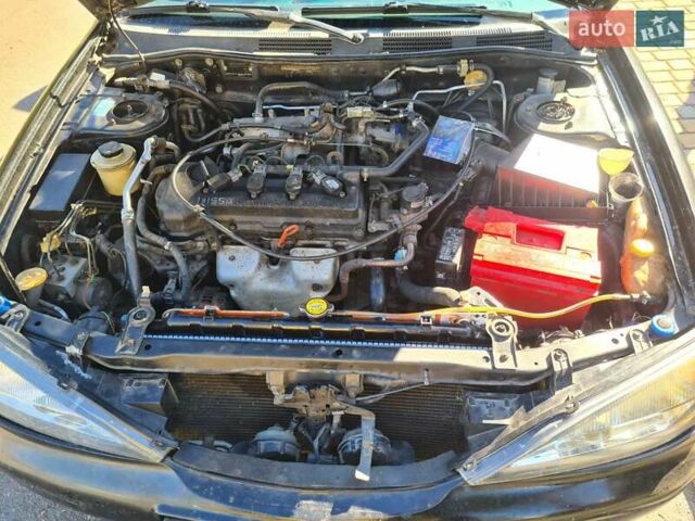 Черный Ниссан Примера, объемом двигателя 1.6 л и пробегом 377 тыс. км за 3200 $, фото 7 на Automoto.ua