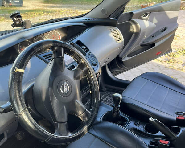 Черный Ниссан Примера, объемом двигателя 2.2 л и пробегом 316 тыс. км за 2350 $, фото 13 на Automoto.ua