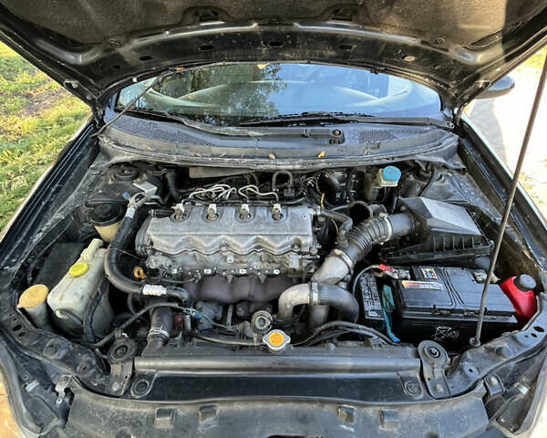 Черный Ниссан Примера, объемом двигателя 2.2 л и пробегом 316 тыс. км за 2350 $, фото 19 на Automoto.ua