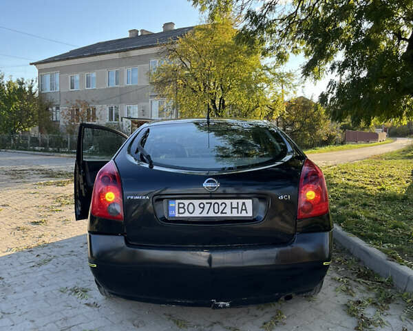 Черный Ниссан Примера, объемом двигателя 2.2 л и пробегом 316 тыс. км за 2350 $, фото 7 на Automoto.ua
