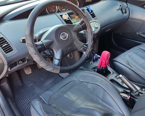 Черный Ниссан Примера, объемом двигателя 1.87 л и пробегом 287 тыс. км за 5500 $, фото 12 на Automoto.ua