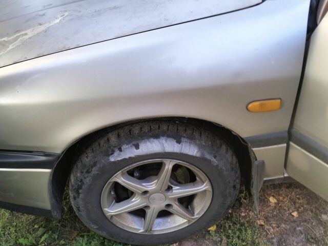 Коричневий Ніссан Прімера, об'ємом двигуна 2 л та пробігом 200 тис. км за 1600 $, фото 6 на Automoto.ua