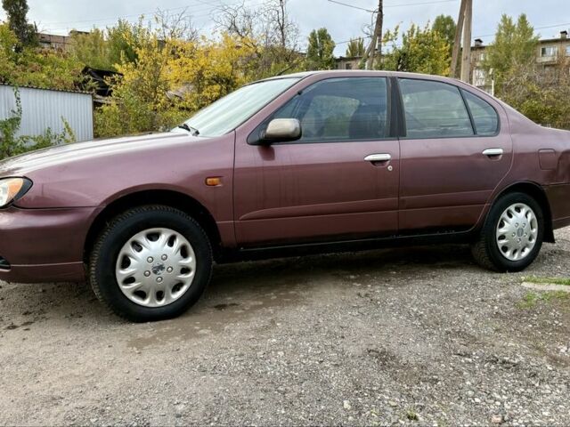 Коричневий Ніссан Прімера, об'ємом двигуна 2 л та пробігом 300 тис. км за 1700 $, фото 3 на Automoto.ua