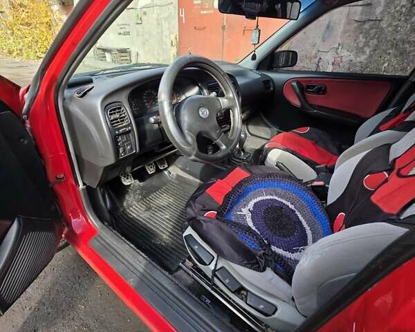 Красный Ниссан Примера, объемом двигателя 2 л и пробегом 403 тыс. км за 2900 $, фото 17 на Automoto.ua