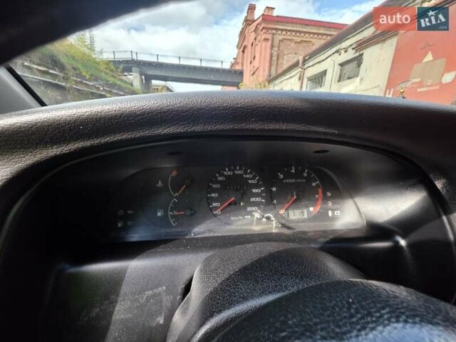 Красный Ниссан Примера, объемом двигателя 2 л и пробегом 403 тыс. км за 2900 $, фото 18 на Automoto.ua