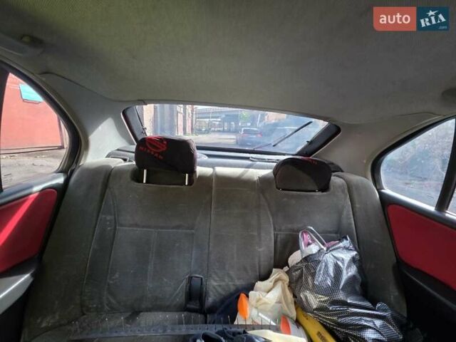 Красный Ниссан Примера, объемом двигателя 2 л и пробегом 403 тыс. км за 2900 $, фото 11 на Automoto.ua