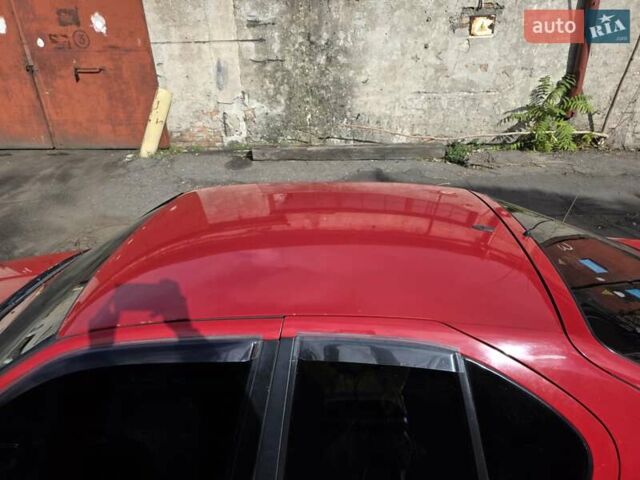 Красный Ниссан Примера, объемом двигателя 2 л и пробегом 403 тыс. км за 2900 $, фото 6 на Automoto.ua