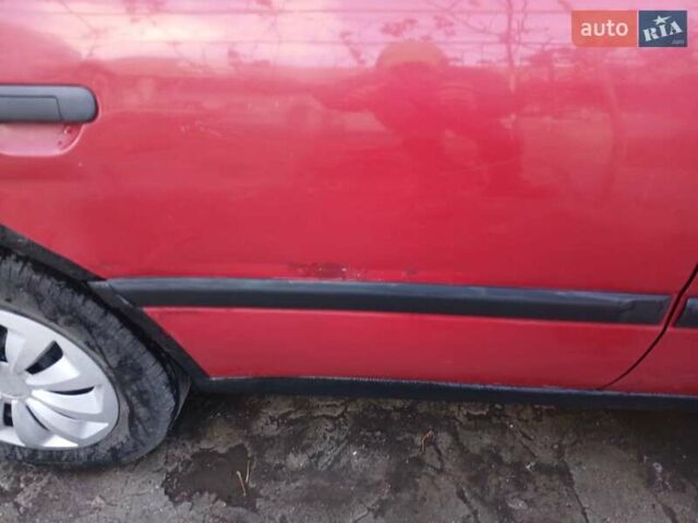 Червоний Ніссан Прімера, об'ємом двигуна 2 л та пробігом 330 тис. км за 2000 $, фото 2 на Automoto.ua