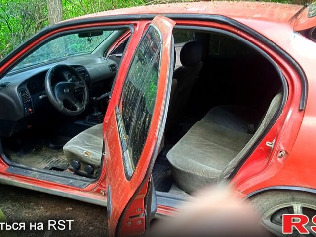 Красный Ниссан Примера, объемом двигателя 2 л и пробегом 0 тыс. км за 850 $, фото 5 на Automoto.ua