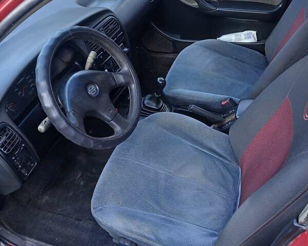 Червоний Ніссан Прімера, об'ємом двигуна 2 л та пробігом 330 тис. км за 2000 $, фото 7 на Automoto.ua