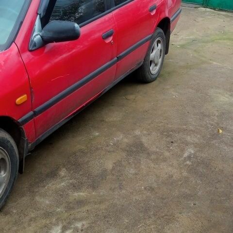 Червоний Ніссан Прімера, об'ємом двигуна 1.6 л та пробігом 33 тис. км за 1500 $, фото 3 на Automoto.ua