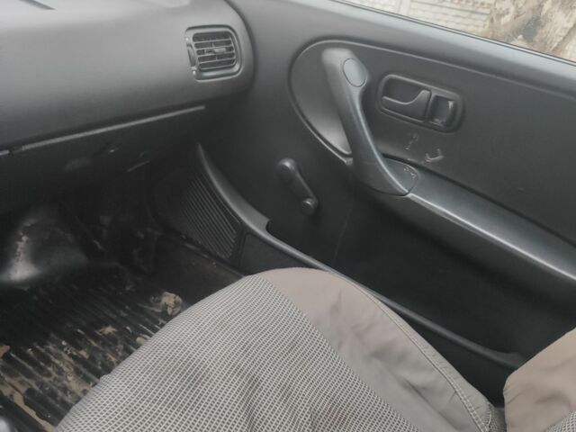 Червоний Ніссан Прімера, об'ємом двигуна 1.6 л та пробігом 400 тис. км за 1300 $, фото 6 на Automoto.ua