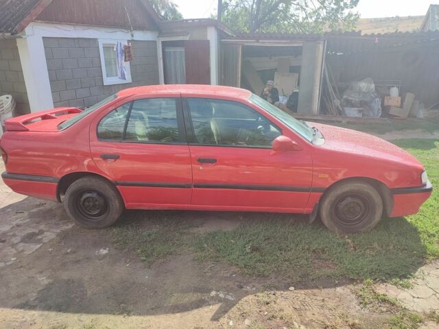 Красный Ниссан Примера, объемом двигателя 1.6 л и пробегом 170 тыс. км за 1677 $, фото 3 на Automoto.ua