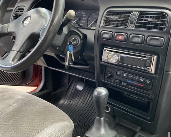 Червоний Ніссан Прімера, об'ємом двигуна 2 л та пробігом 400 тис. км за 1200 $, фото 17 на Automoto.ua