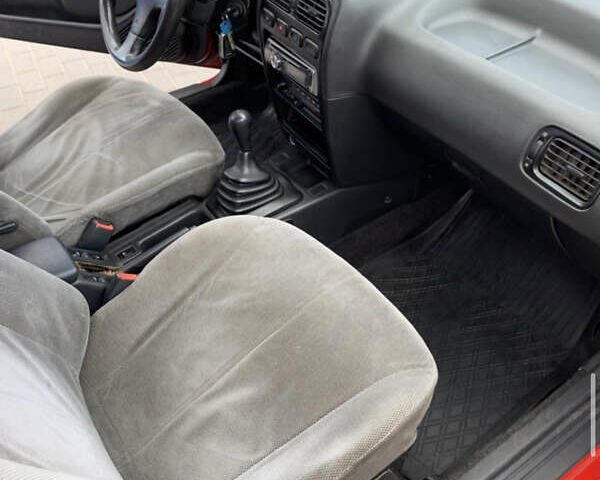 Червоний Ніссан Прімера, об'ємом двигуна 2 л та пробігом 400 тис. км за 1200 $, фото 16 на Automoto.ua