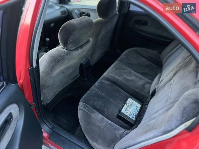 Червоний Ніссан Прімера, об'ємом двигуна 1.97 л та пробігом 300 тис. км за 1100 $, фото 9 на Automoto.ua
