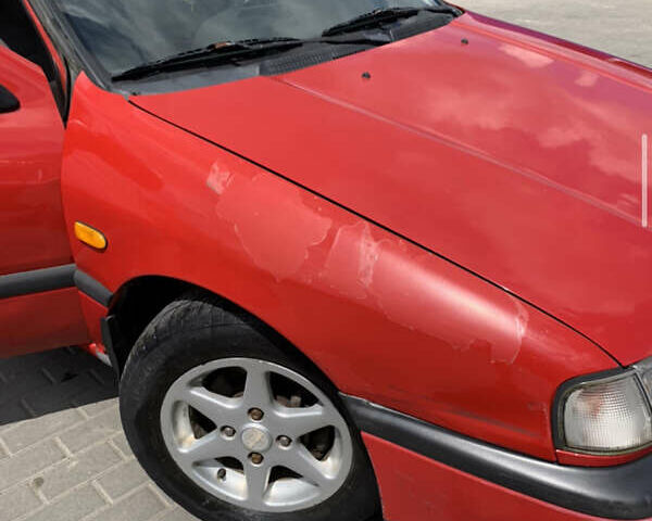 Червоний Ніссан Прімера, об'ємом двигуна 2 л та пробігом 400 тис. км за 1200 $, фото 9 на Automoto.ua