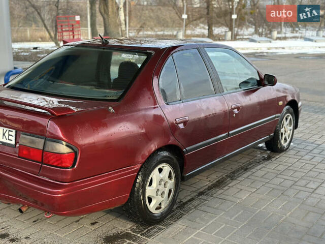 Червоний Ніссан Прімера, об'ємом двигуна 1.6 л та пробігом 312 тис. км за 1950 $, фото 3 на Automoto.ua