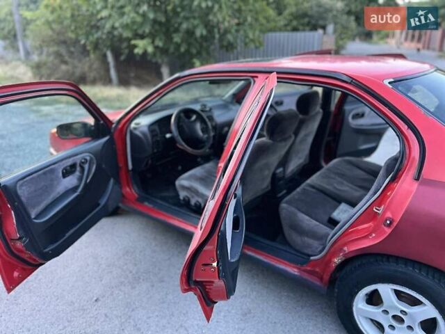 Червоний Ніссан Прімера, об'ємом двигуна 1.97 л та пробігом 300 тис. км за 1100 $, фото 10 на Automoto.ua