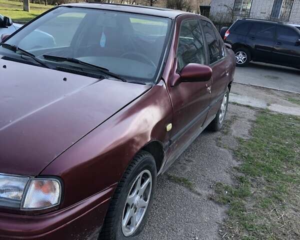 Червоний Ніссан Прімера, об'ємом двигуна 1.6 л та пробігом 317 тис. км за 1600 $, фото 3 на Automoto.ua