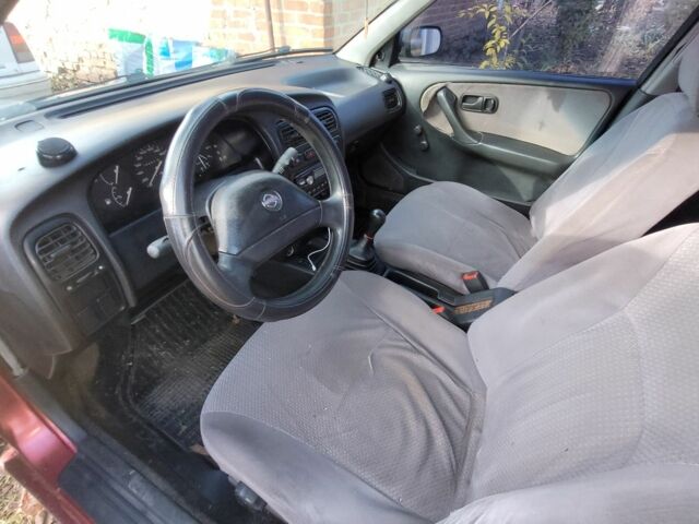 Красный Ниссан Примера, объемом двигателя 1.6 л и пробегом 200 тыс. км за 2000 $, фото 4 на Automoto.ua