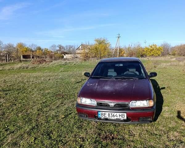 Червоний Ніссан Прімера, об'ємом двигуна 2 л та пробігом 486 тис. км за 1600 $, фото 1 на Automoto.ua