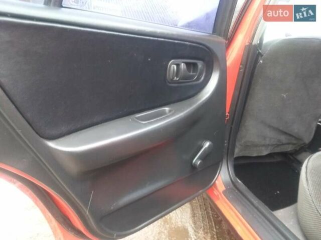 Красный Ниссан Примера, объемом двигателя 1.6 л и пробегом 230 тыс. км за 2500 $, фото 8 на Automoto.ua