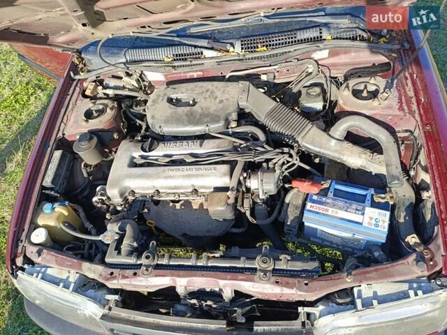 Червоний Ніссан Прімера, об'ємом двигуна 2 л та пробігом 486 тис. км за 1600 $, фото 11 на Automoto.ua