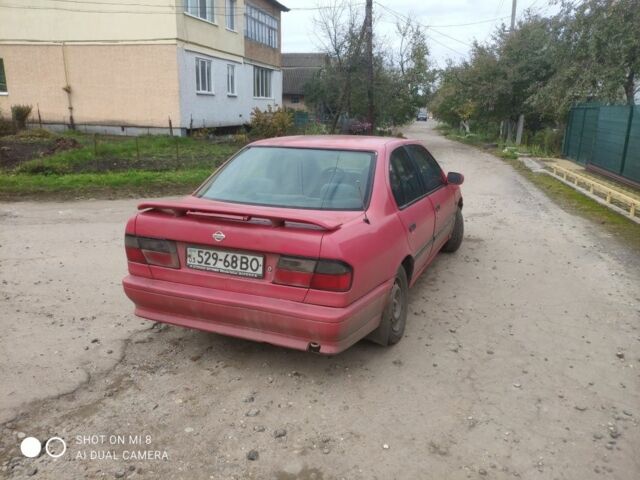 Красный Ниссан Примера, объемом двигателя 1.6 л и пробегом 244 тыс. км за 670 $, фото 2 на Automoto.ua