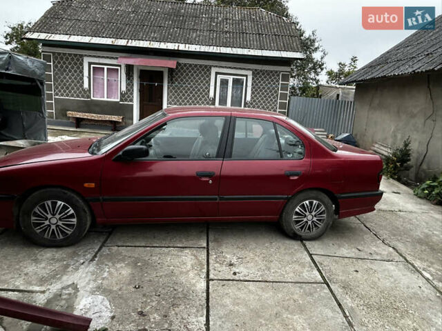 Красный Ниссан Примера, объемом двигателя 1.6 л и пробегом 180 тыс. км за 1500 $, фото 4 на Automoto.ua