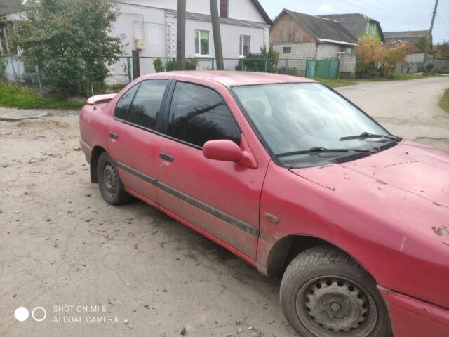 Красный Ниссан Примера, объемом двигателя 1.6 л и пробегом 244 тыс. км за 670 $, фото 1 на Automoto.ua