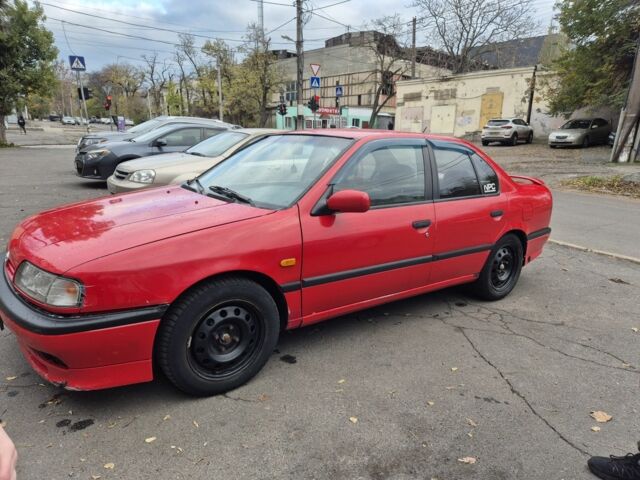 Красный Ниссан Примера, объемом двигателя 2 л и пробегом 470 тыс. км за 1800 $, фото 2 на Automoto.ua
