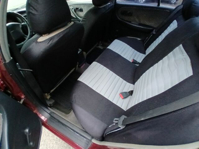 Красный Ниссан Примера, объемом двигателя 1.6 л и пробегом 250 тыс. км за 2800 $, фото 11 на Automoto.ua