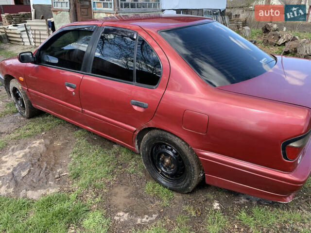 Красный Ниссан Примера, объемом двигателя 2 л и пробегом 329 тыс. км за 1800 $, фото 7 на Automoto.ua