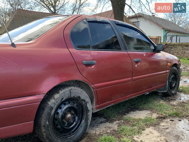 Красный Ниссан Примера, объемом двигателя 2 л и пробегом 329 тыс. км за 1800 $, фото 5 на Automoto.ua