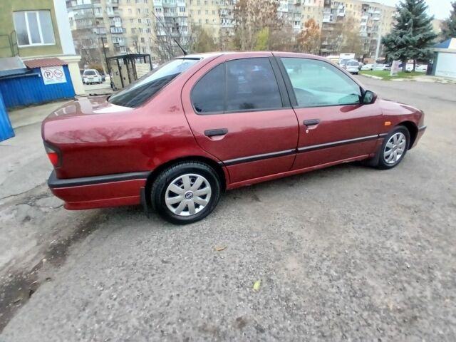 Красный Ниссан Примера, объемом двигателя 1.6 л и пробегом 250 тыс. км за 2800 $, фото 5 на Automoto.ua