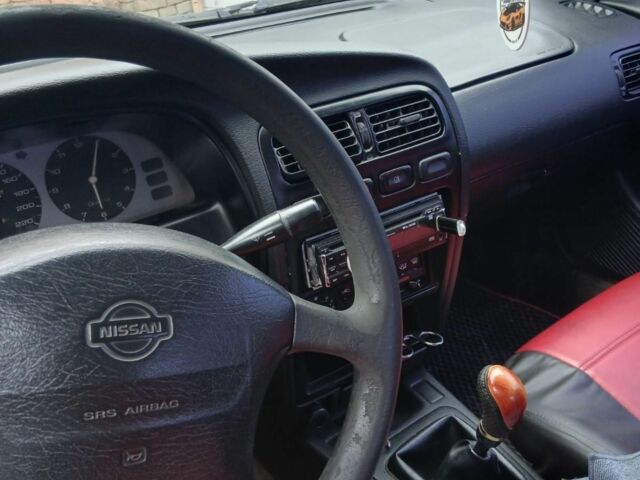 Червоний Ніссан Прімера, об'ємом двигуна 1.6 л та пробігом 280 тис. км за 2000 $, фото 6 на Automoto.ua