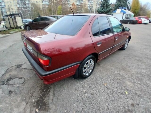 Красный Ниссан Примера, объемом двигателя 1.6 л и пробегом 250 тыс. км за 2800 $, фото 4 на Automoto.ua