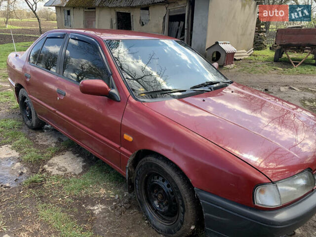 Красный Ниссан Примера, объемом двигателя 2 л и пробегом 329 тыс. км за 1800 $, фото 8 на Automoto.ua