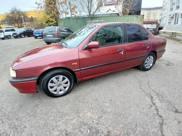 Червоний Ніссан Прімера, об'ємом двигуна 1.6 л та пробігом 250 тис. км за 2100 $, фото 1 на Automoto.ua