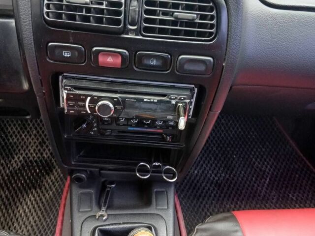 Червоний Ніссан Прімера, об'ємом двигуна 1.6 л та пробігом 280 тис. км за 2000 $, фото 5 на Automoto.ua